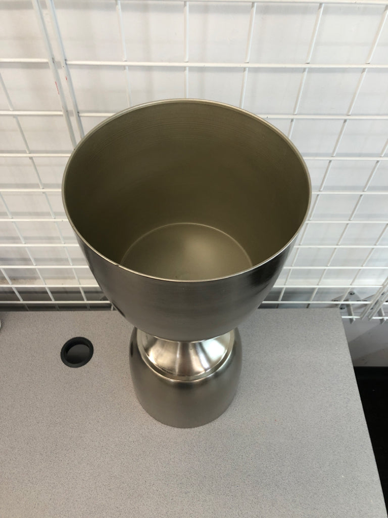 STAINLESS STEEL HOUR GLASS SHAPED PLANTER.