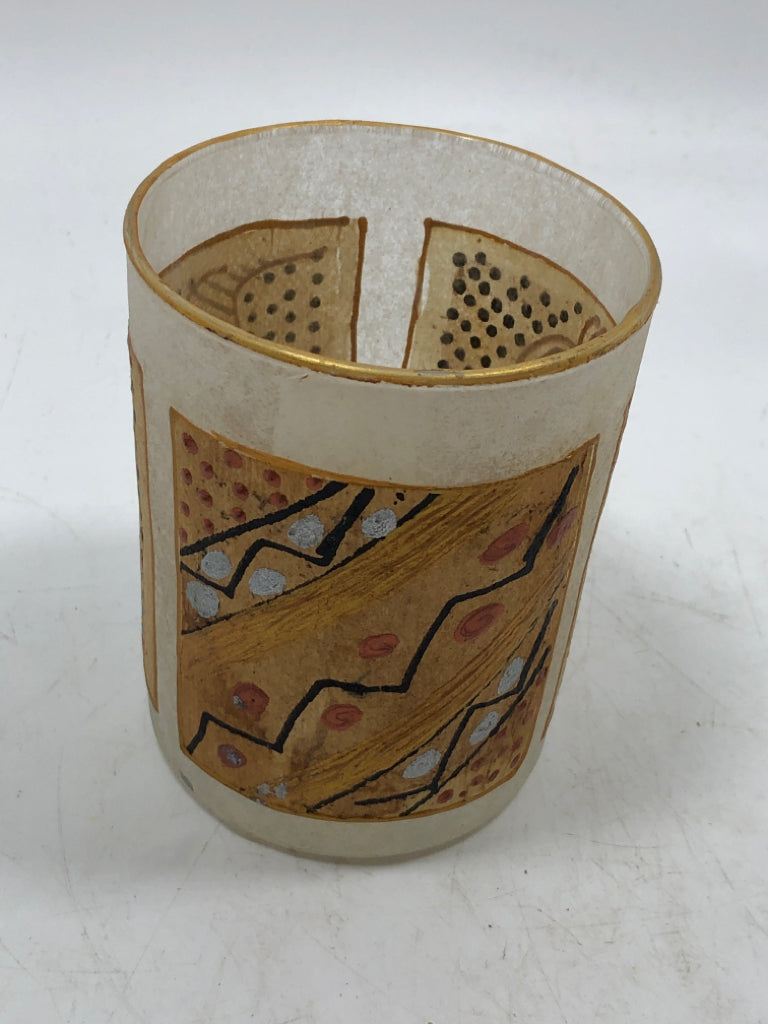 ABSTRACT T-BAG VOTIVE HOLDER CUP.