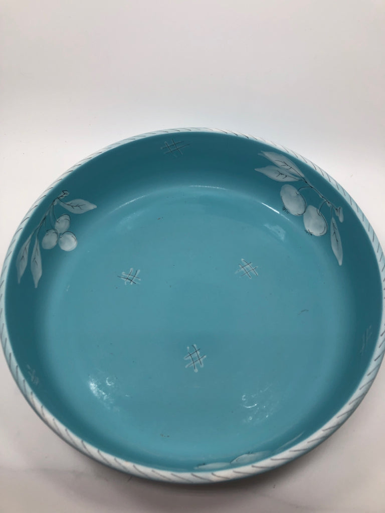 BLUE CERAMIC SERVING BOWL W/WHITE PAINTED FRUITS.