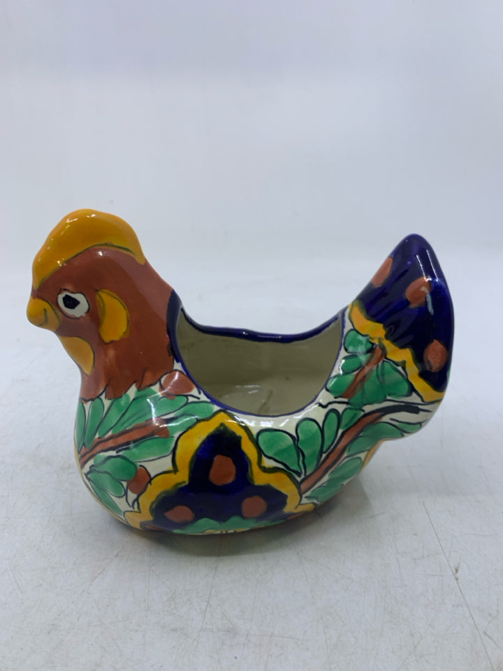 TERRA COTTA LAYING HEN W/ COLORFUL DESIGNS.