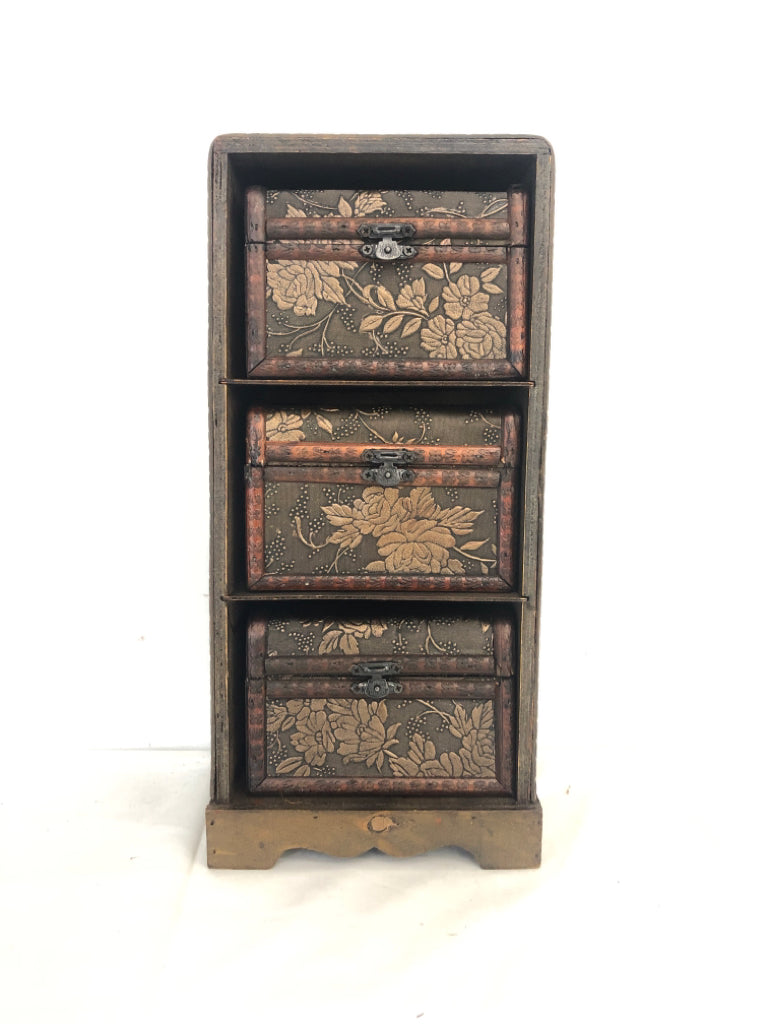 TRIPLE EMBOSSED STORAGE CUBES IN SHELF.