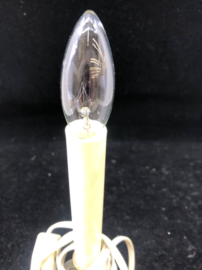 WHITE PLUG IN WINDOW CANDLE.