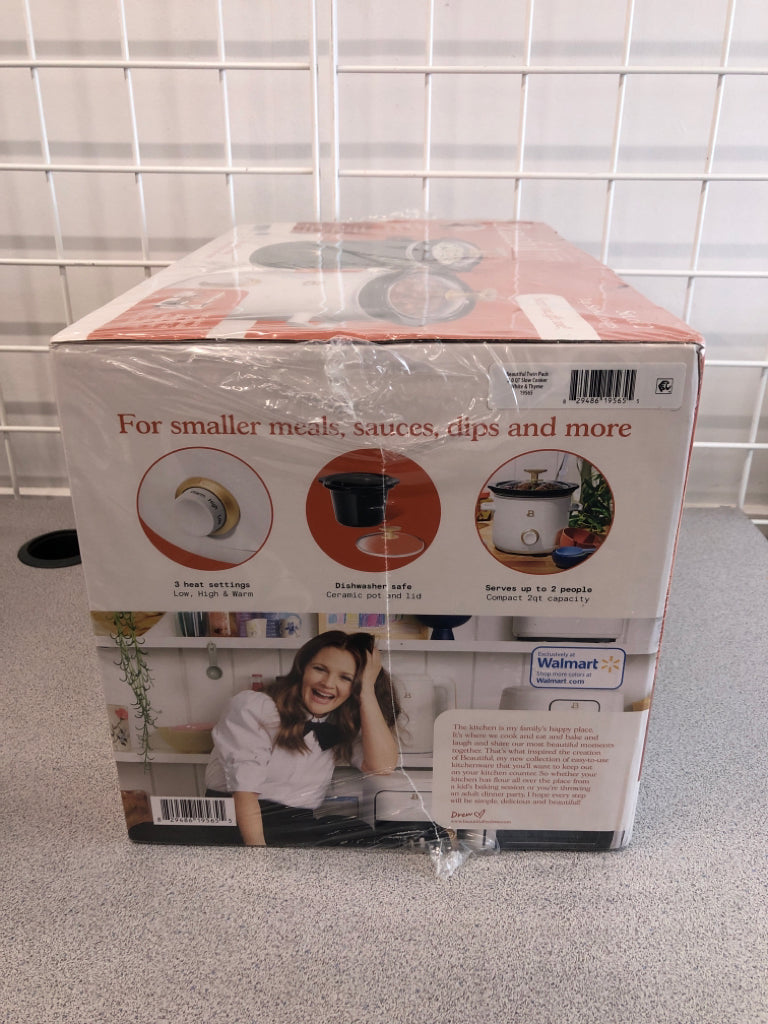 2 NIB SMALL SLOW COOKERS.