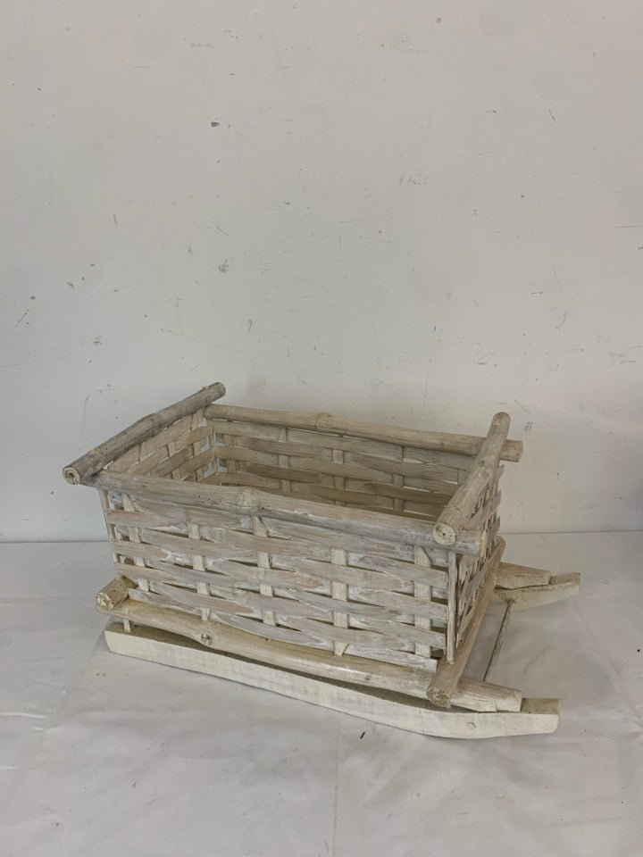 WHITE DISTRESSED WOOD SLED DECOR.