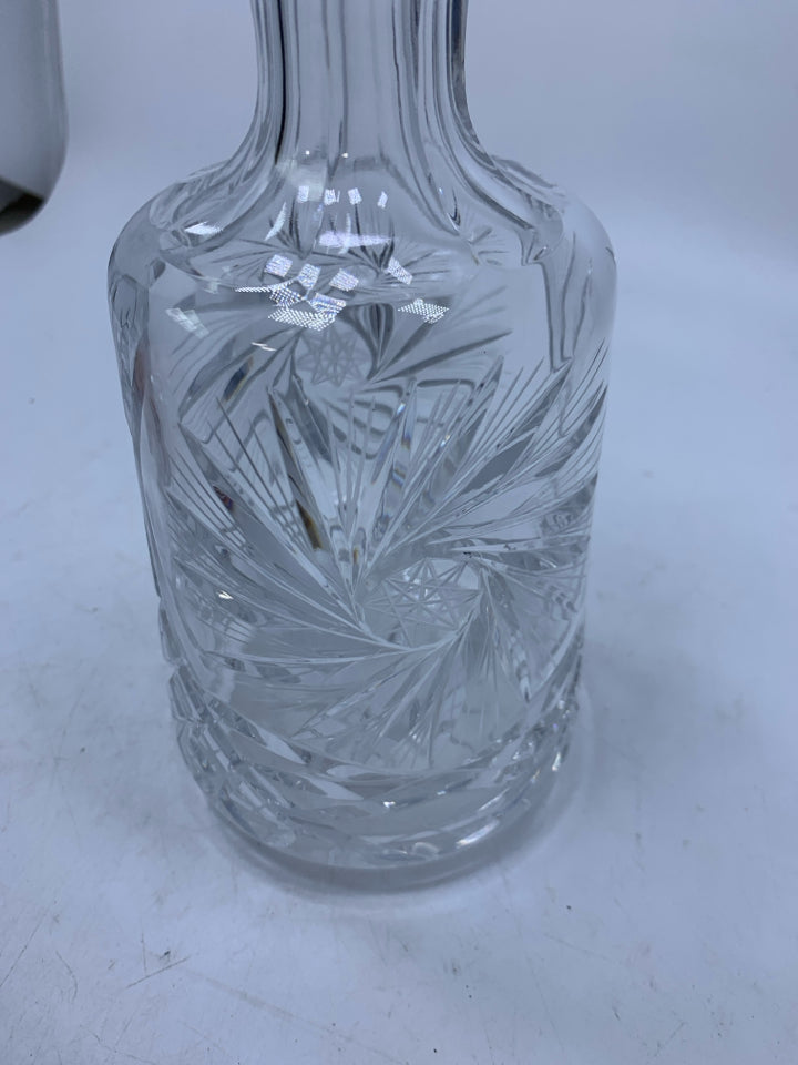 CRYSTAL DECANTER STAR DETAILS AND LARGE BALL STOPPER.