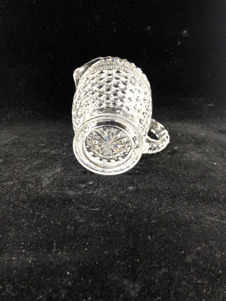 SMALL CLEAR CUT GLASS PITCHER.