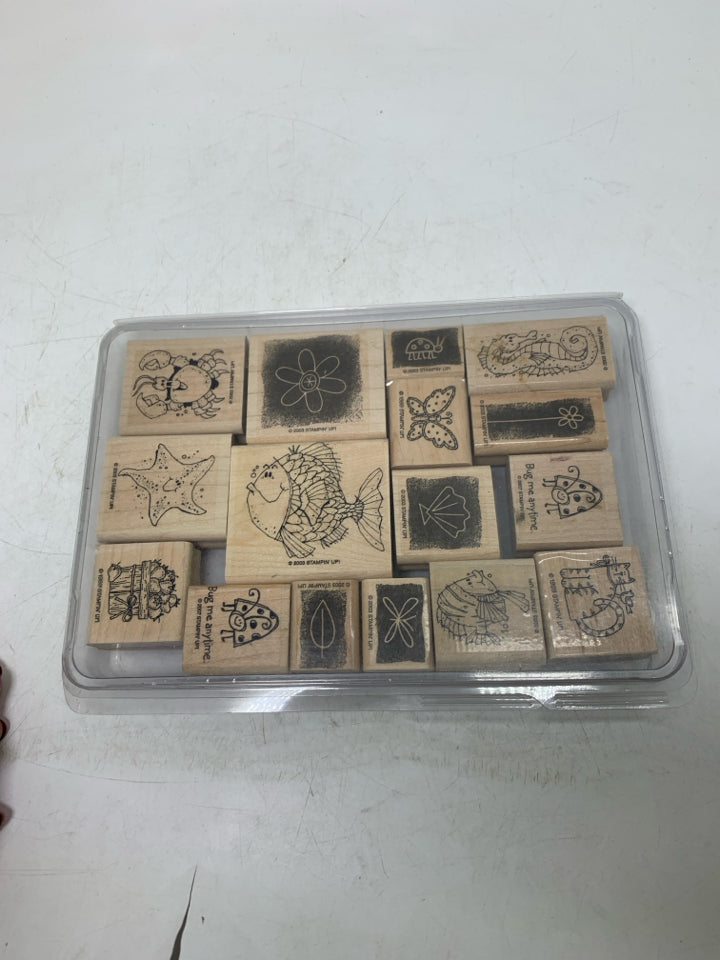 STAMPS IN CASE.