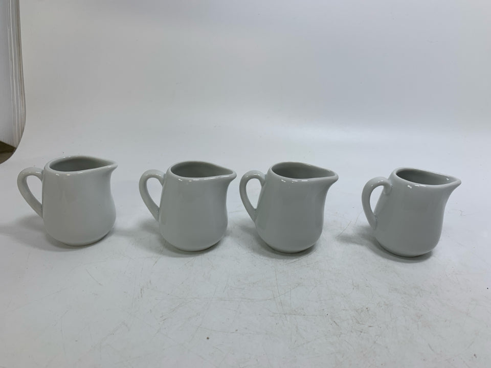4 MINI WHITE PORCELAIN PERSONAL CREAMERS.