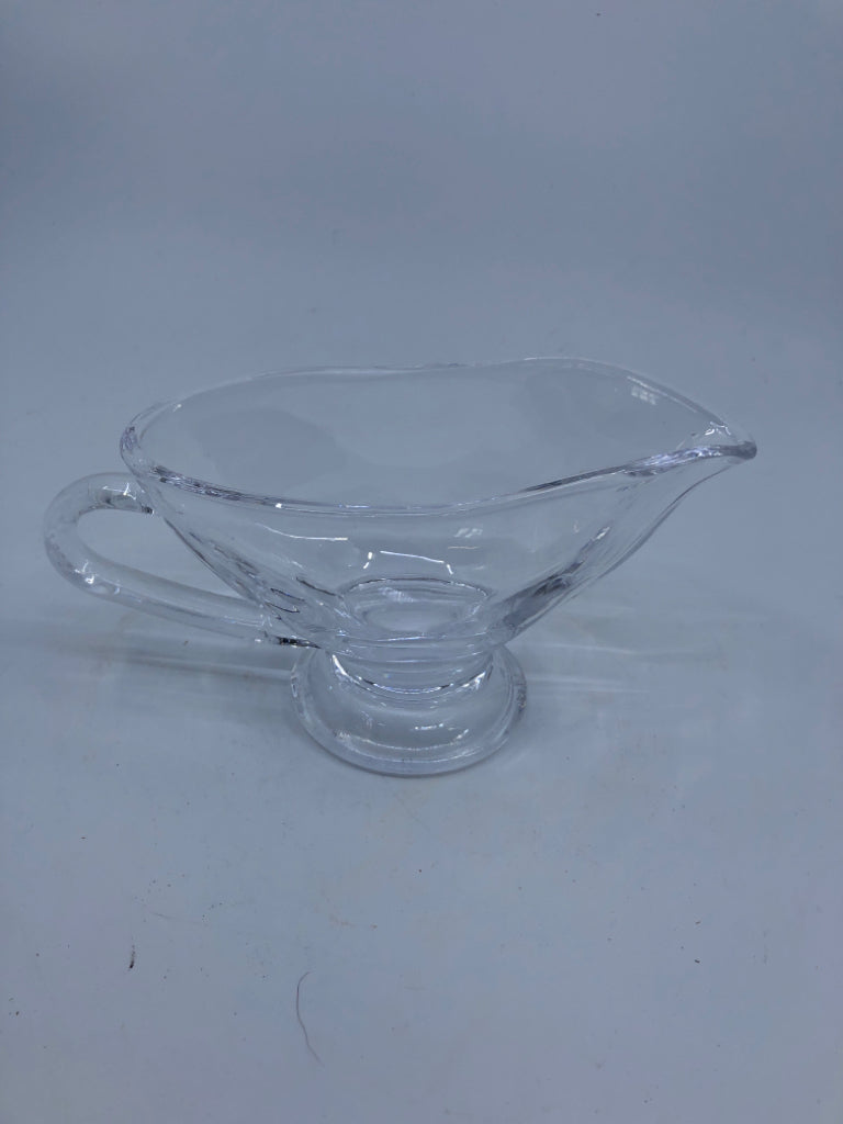 CLEAR FOOTED GLASS GRAVY BOAT.