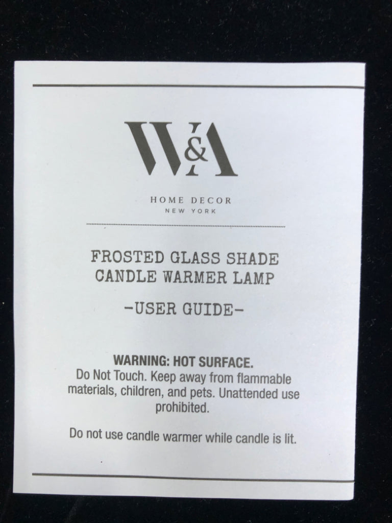 NIB CANDLE WARMER.