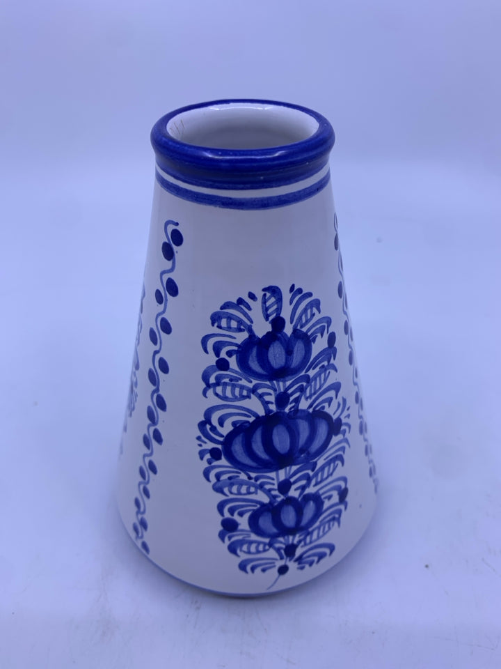 WHITE/BLUE POTTERY VASE TRIANGLE SHAPED W/ DESIGNS.