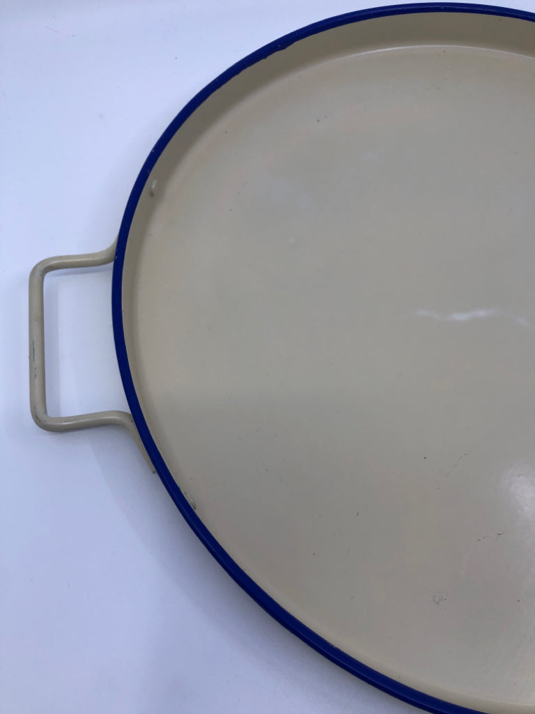 CREAM ROUND METAL TRAY W BLUE RIM.