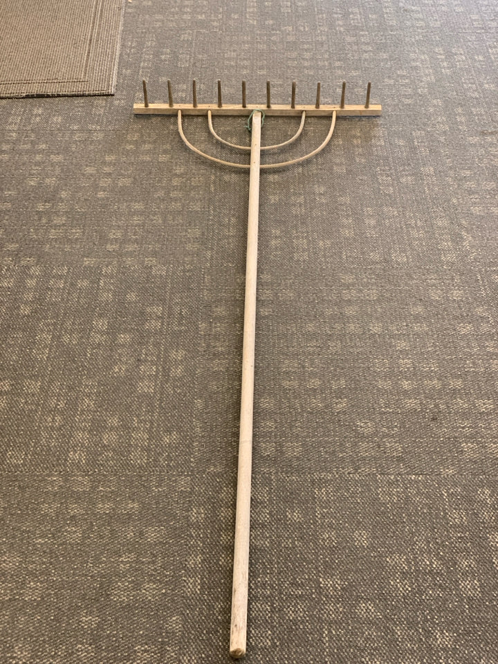 DECORATIVE WOOD RAKE.