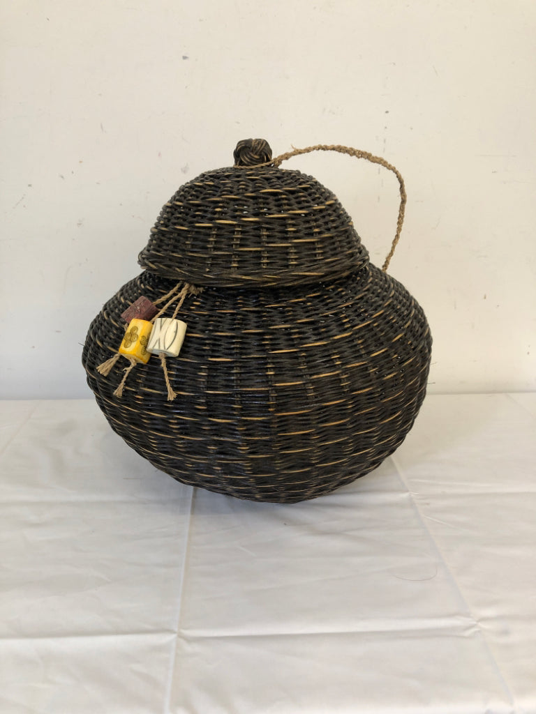 DARK WICKER WOVEN BASKET W CHARMS AND LID.