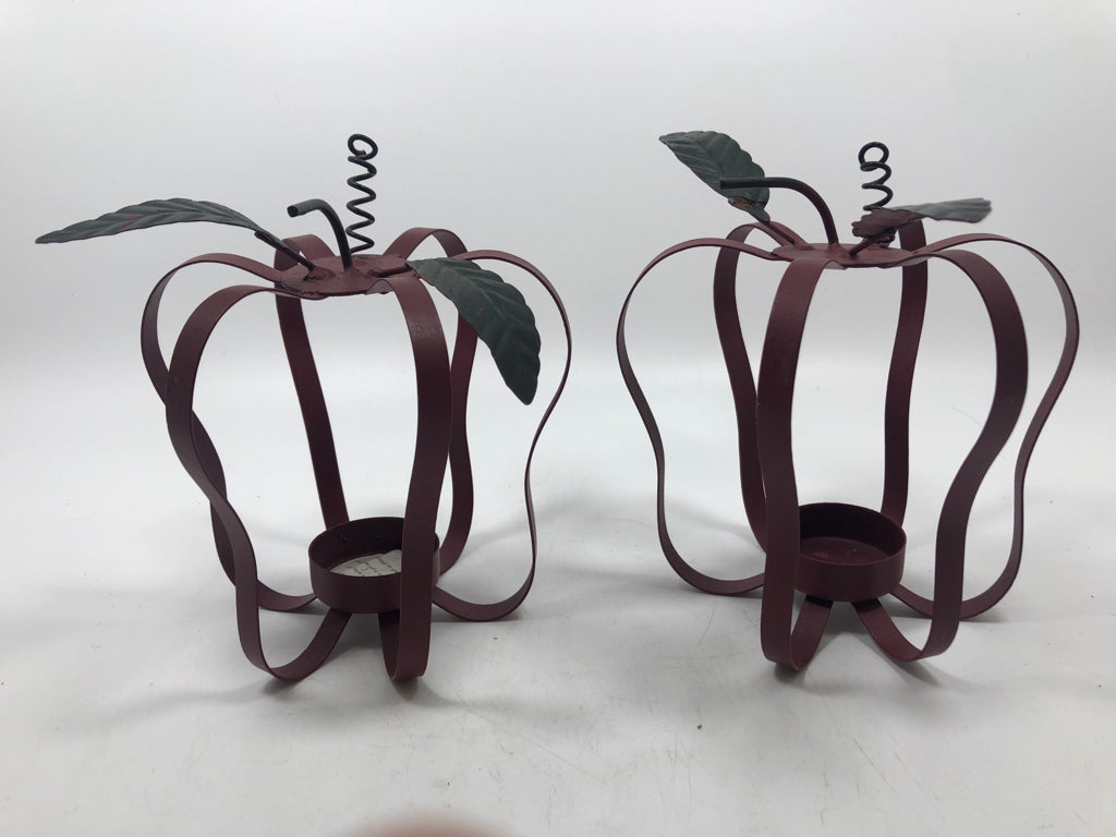 2 RED METAL APPLE VOTIVE CANDLE HOLDERS.