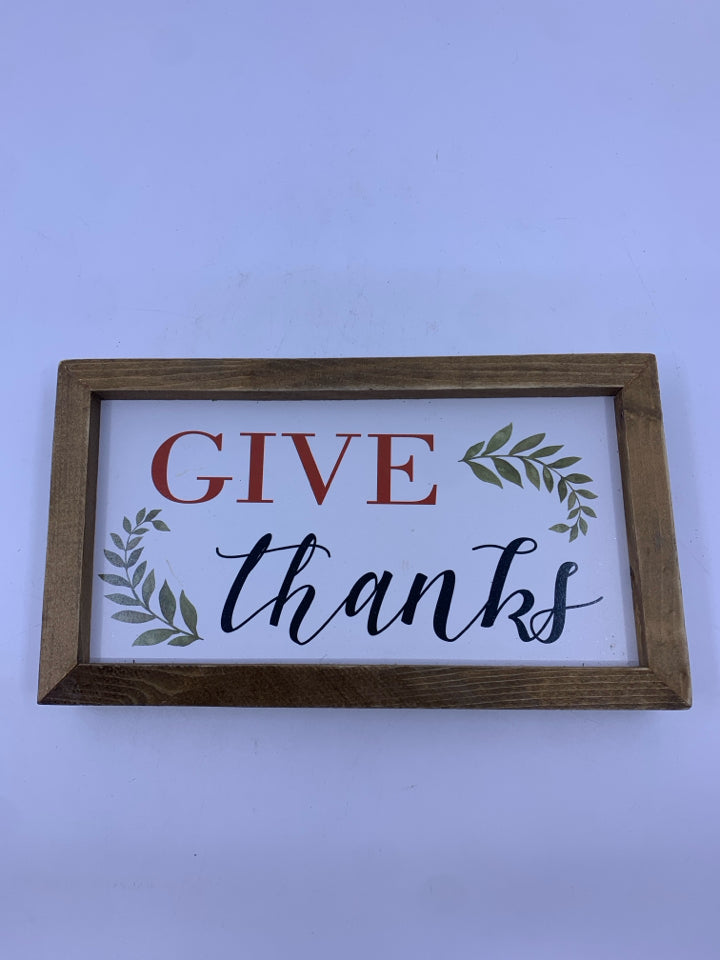 GIVE THANKS STANDING SIGN IN WOOD FRAME.