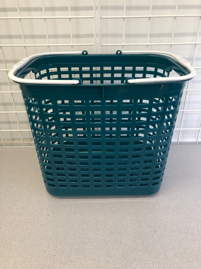 PLASTIC TEAL LAUNDRY BASKET W/WHITE HANDLE.