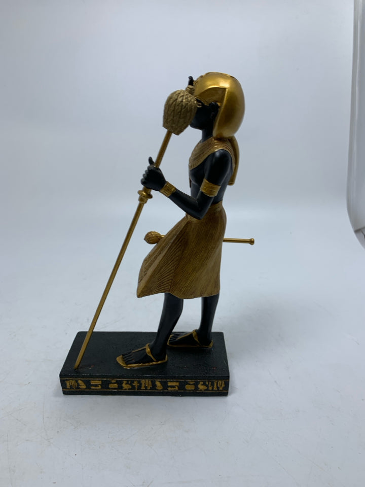 GOLD STANDING EGYPTIAN STYLE MAN W/ SANDALS HOLING STICK RESIN.