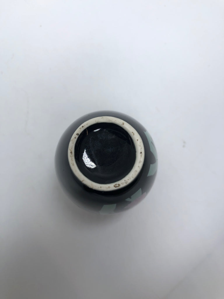 IRIS PAINTED BLACK CERAMIC BUD VASE.