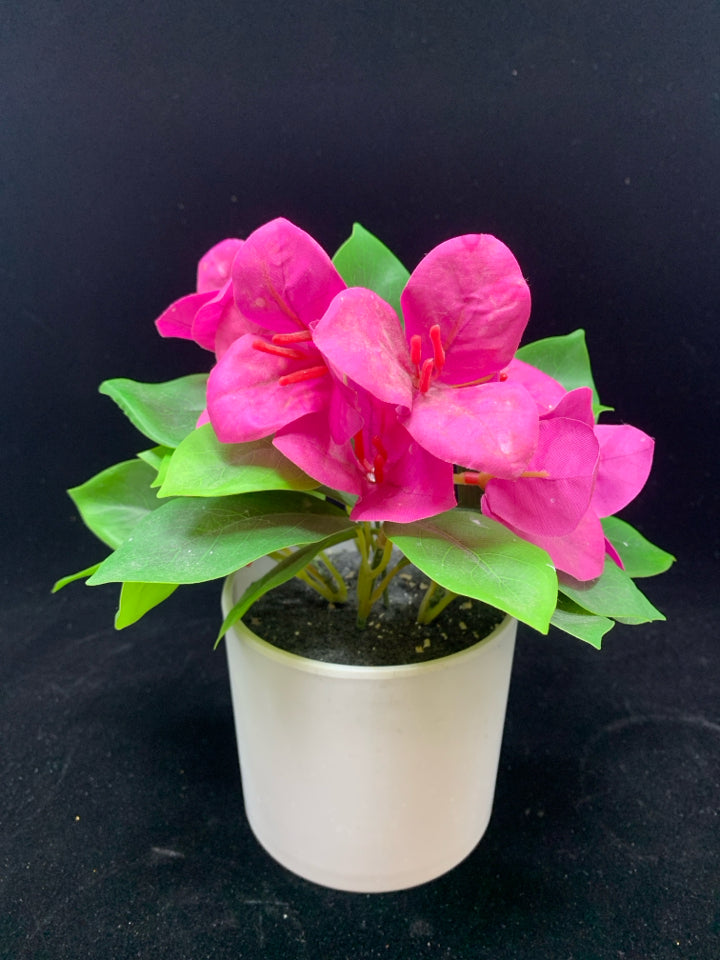 FAUX PINK FLORAL IN WHITE POT.