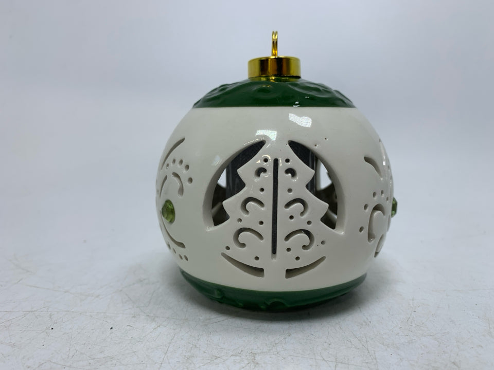 CIRCLE PIERCED LIGHT UP CERAMIC ORNAMENT.