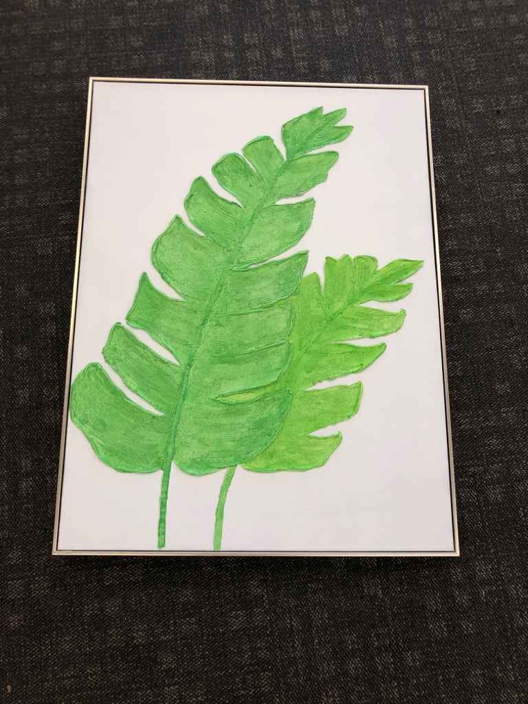 GREEN LEAF TEXTURED PAINT CANVAS IN GOLD FRAME.