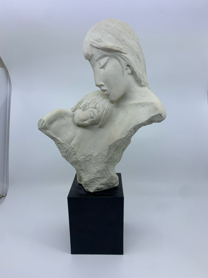 HEAVY MOM AND CHILD STATUE ON BLACK BASE.