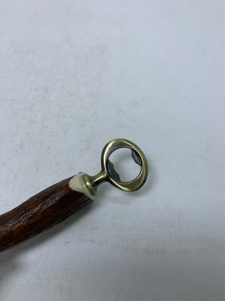 FAUX ANIMAL HORN/ANTLER BOTTLE OPENER.