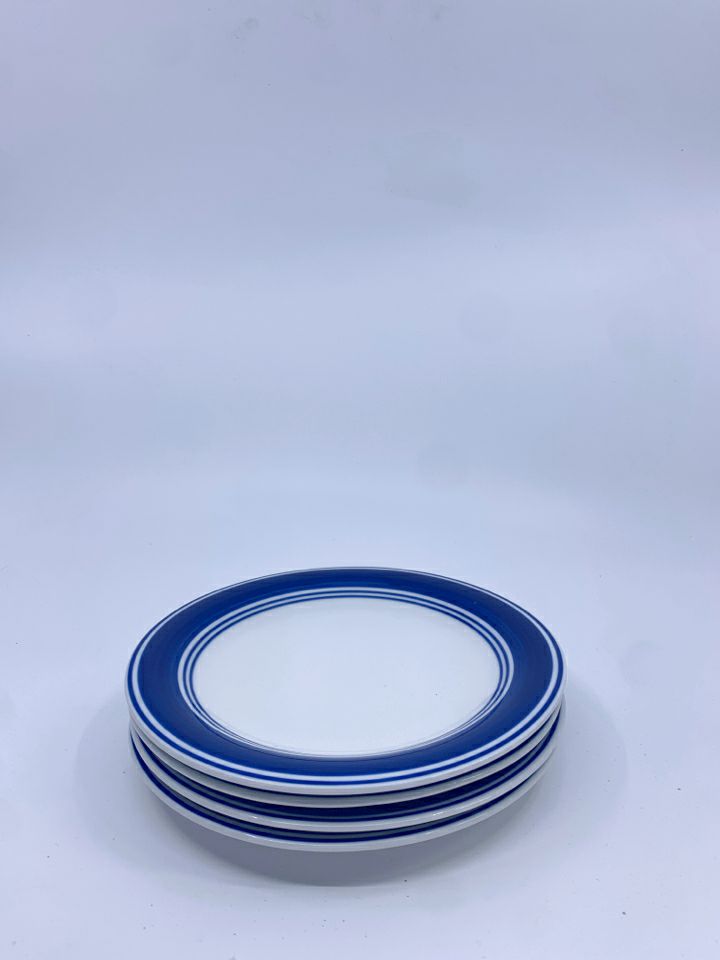 4 BLUE RIMMED DESSERT PLATES.