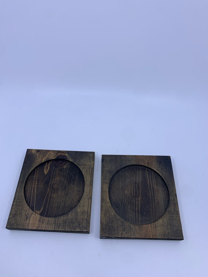 2 WOOD CANDLE PLATES.