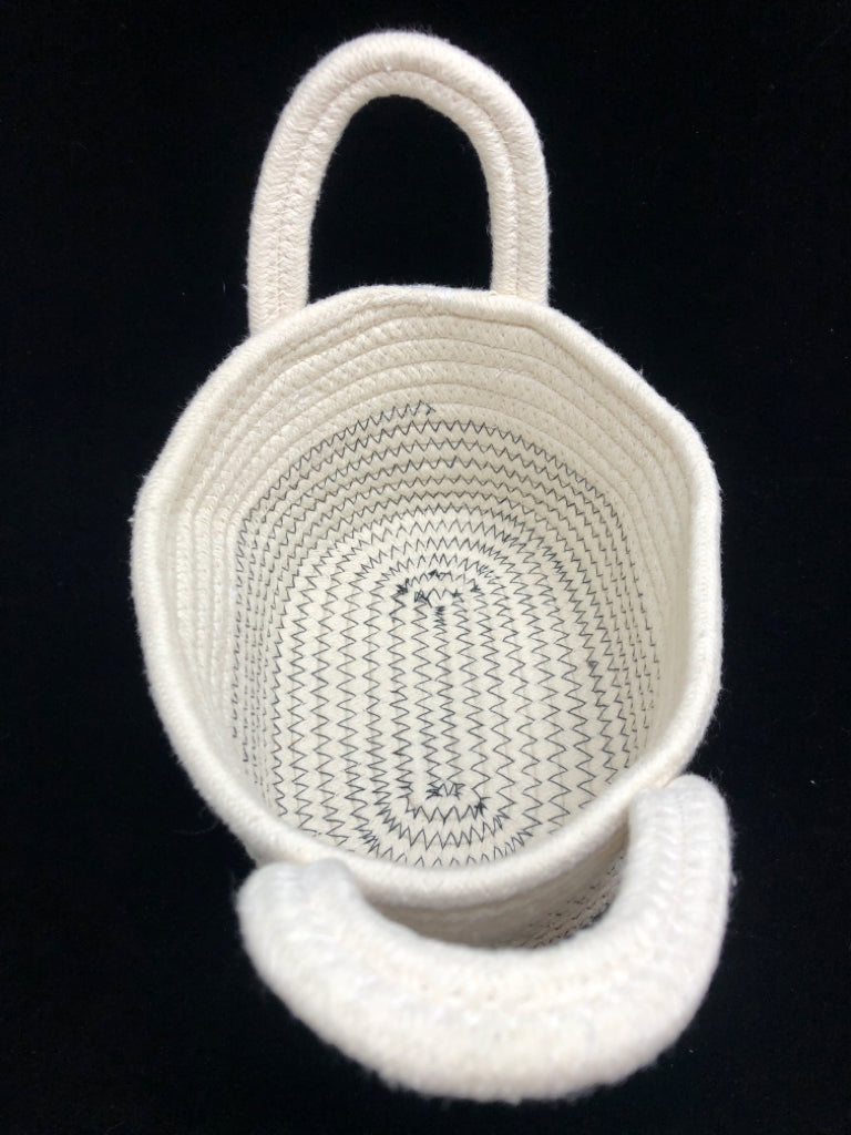 WHITE OVAL FABRIC BIN W/HANDLES.