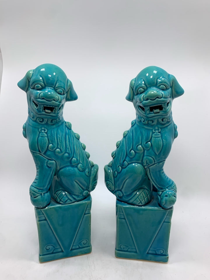 2 BLUE GLAZED FOO DOG STATUES.