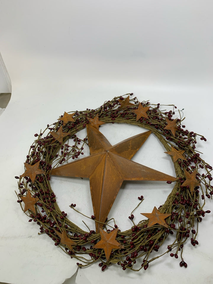 RUSTED STARS WREATH W/ PIP BERRIES.