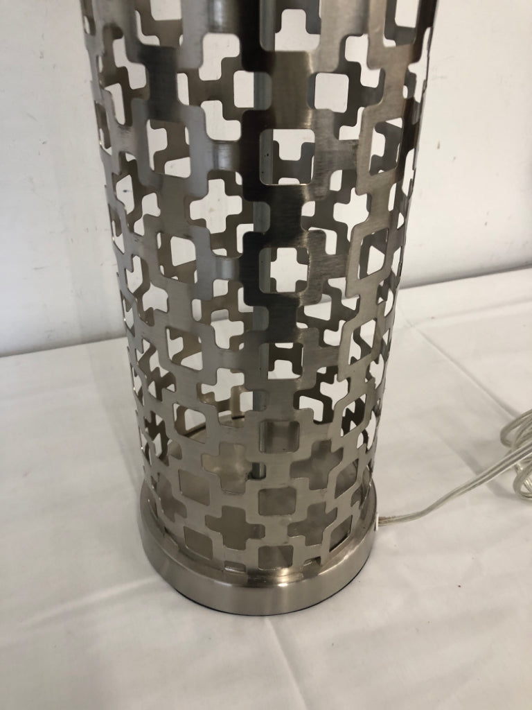 SILVER CUTOUT CYLINDER BASE LAMP W/ CREAM SHADE 3 WAY.