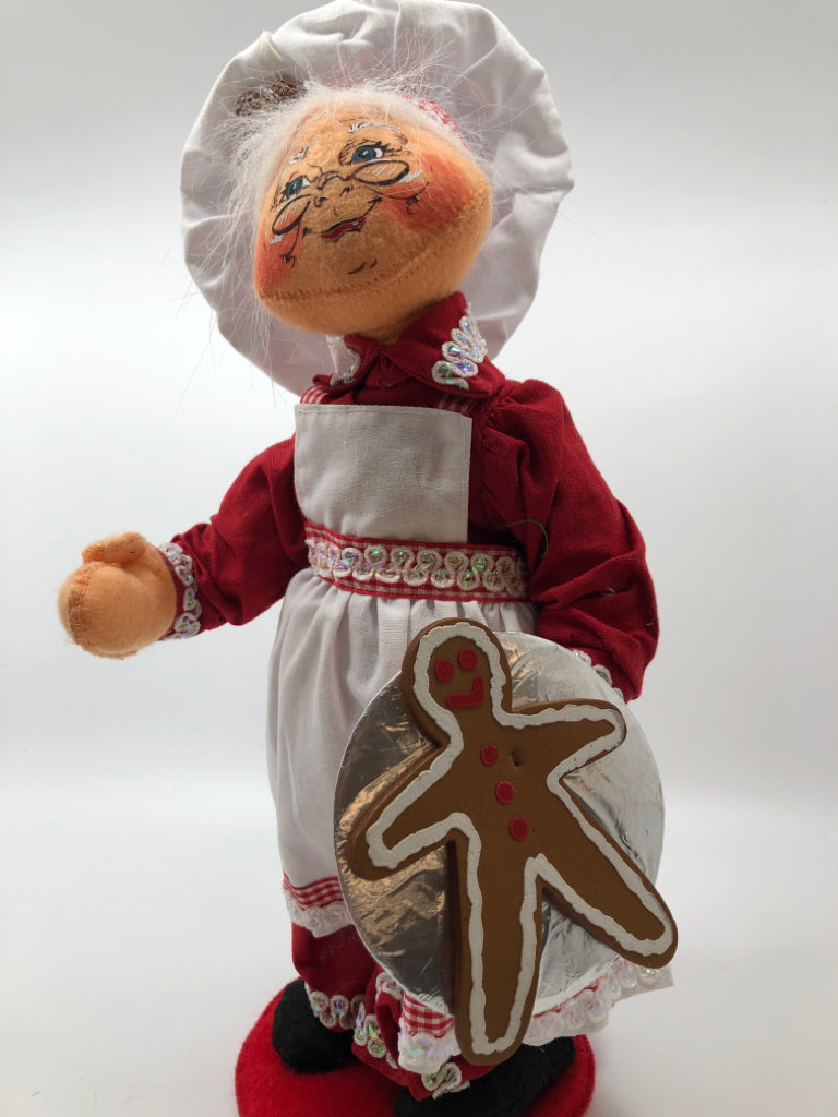 ANNALEE MRS CLAUS DRESSED IN APRON/ CHEFS HAT.
