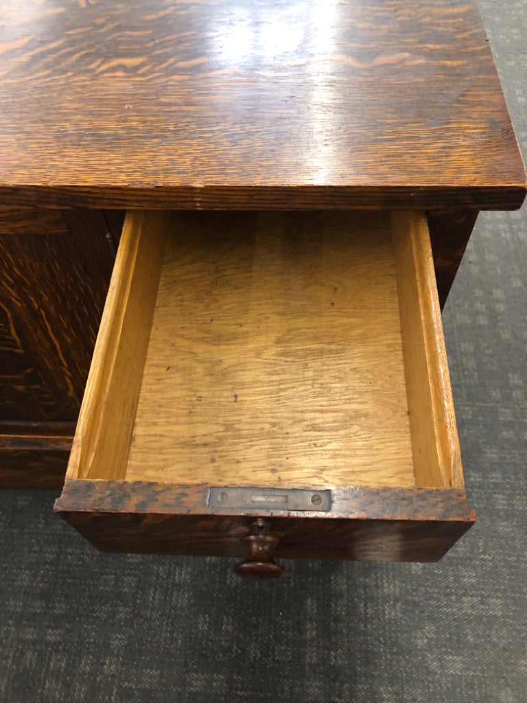 VTG LARGE BUFFET TABLE W 3 DRAWERS AND CABINET ON WHEELS.