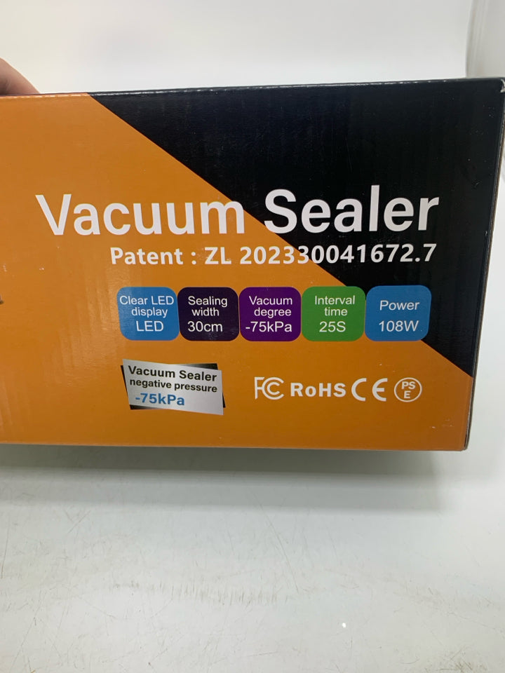 NIB VACUUM SEALER MACHINE.