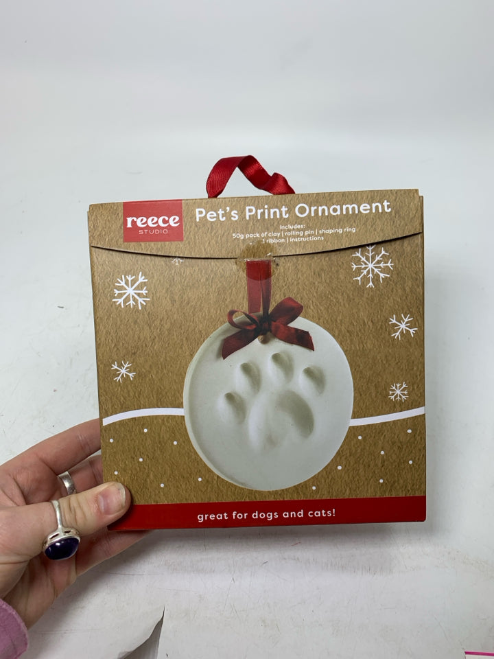 NIB PETS PAW PRINT ORNAMENT.