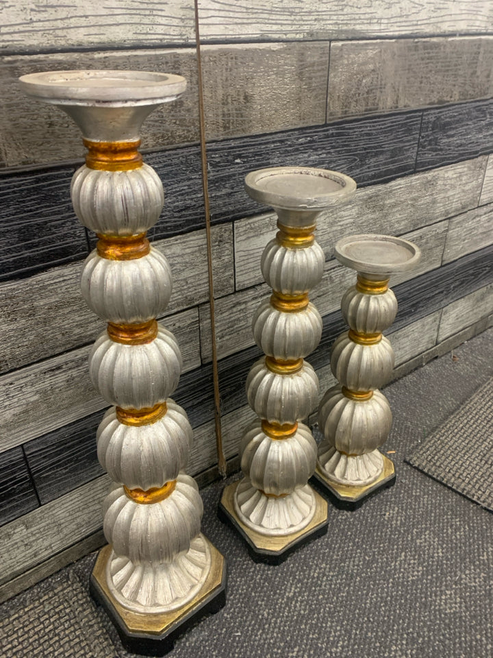 3 PC SILVER STACKING BALLS W/ GOLD DETAILS.
