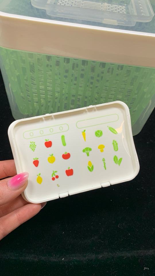 OXO PLASTIC VEGETABLE STRAINER AND STORAGE.