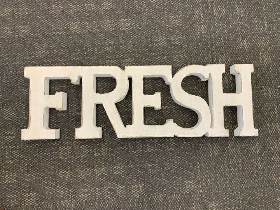 LARGE WHITE FRESH SIGN.