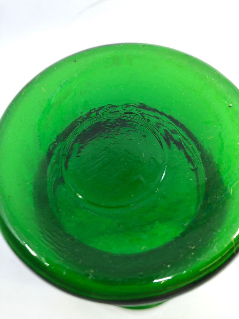 FOOTED GREEN GLASS VASE.