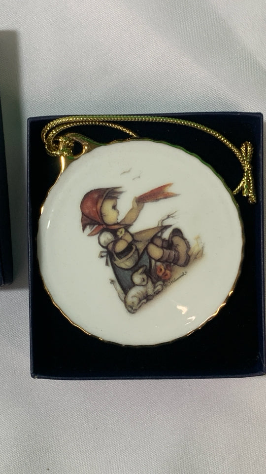 LITTLE GIRL HUMMEL ORNAMENT.