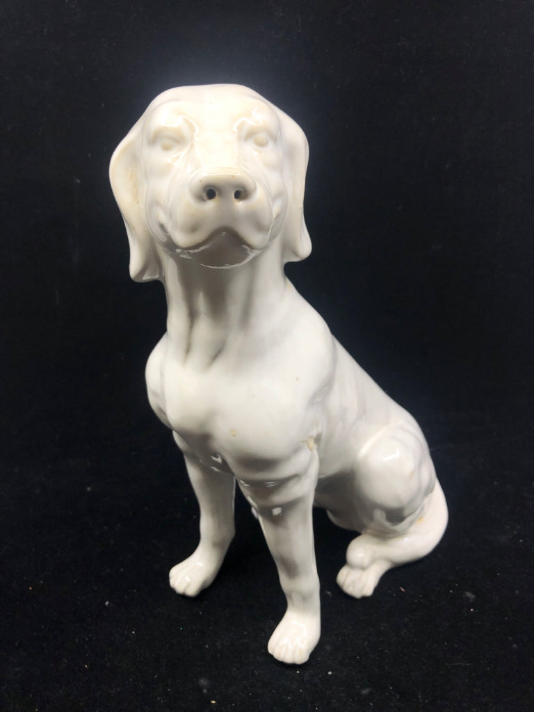 WHITE CERAMIC SITTING DOG.