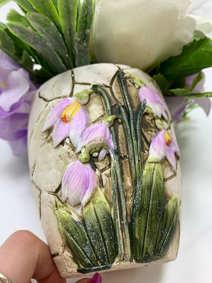 FAUX WHITE ROSES IN CRACKLE CERAMIC POT.