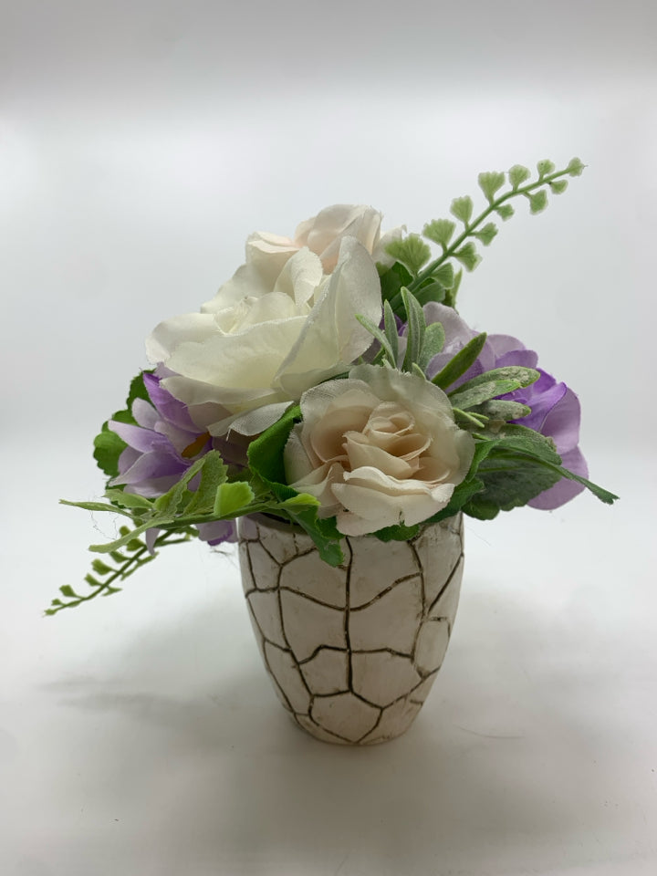 FAUX WHITE ROSES IN CRACKLE CERAMIC POT.