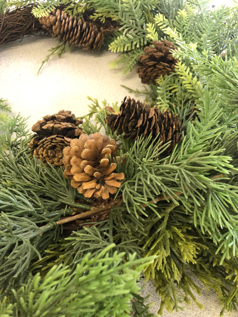 PINECONE AND FERN LEAVES WREATH.