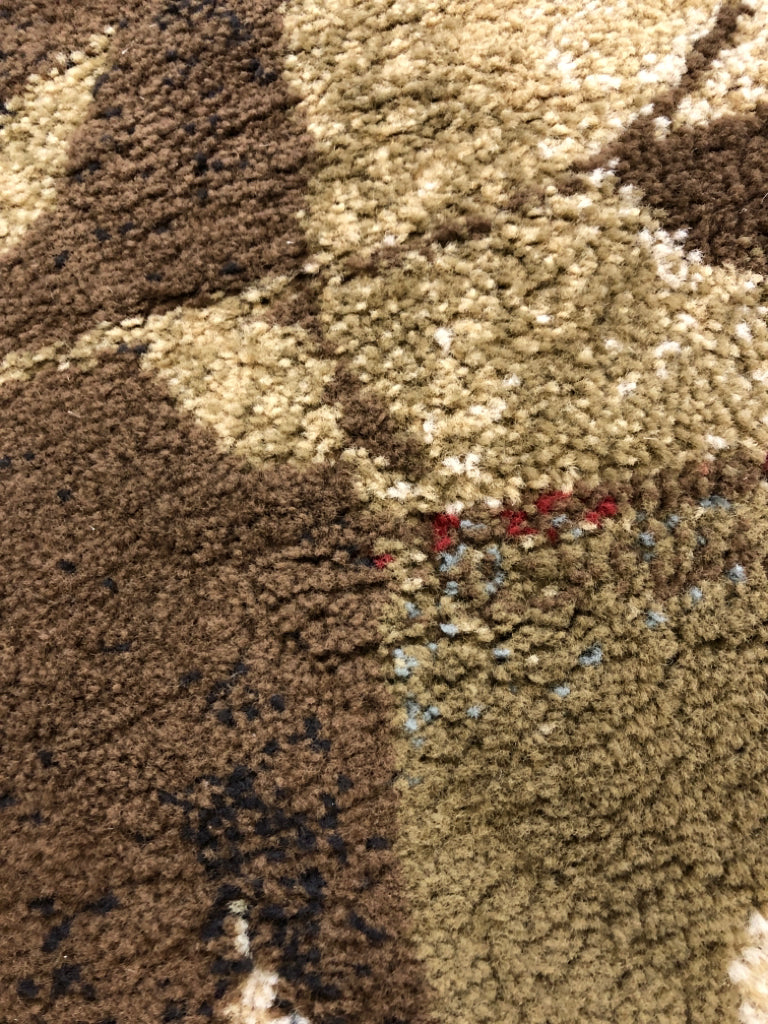 MULTICOLORED RUG W/LEAVES BROWN, RED & BLUE ORIENTAL WEAVERS.