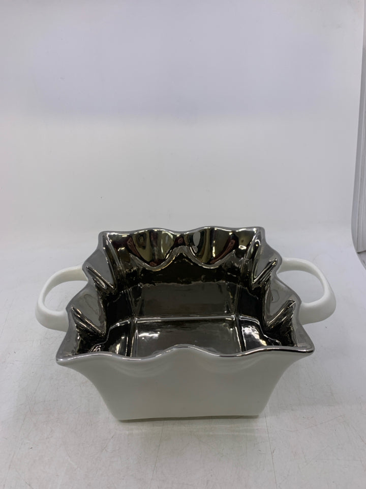 WHITE SQUARE BOWL W/ SILVER INSIDE RUFFLED EDGE HANDLES.