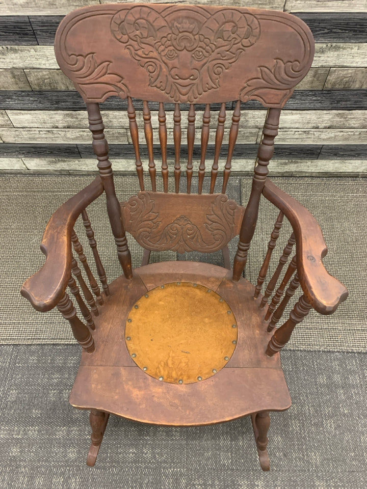 VTG DARK WOOD RAM CARVED ROCKING CHAIR.